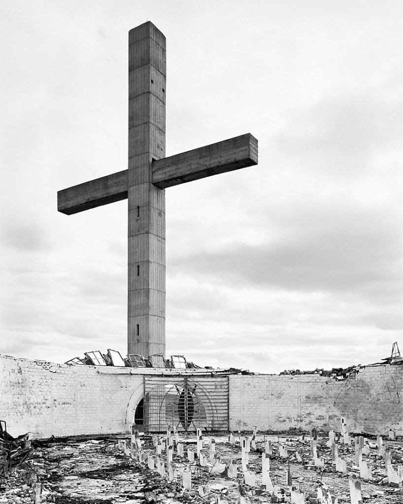 David Goldblatt (South African, 1930-2018) 'Assegais, shield, and 23-metre-high cross of the Nederduitse Gereformeerde Kerk in Afrika, (Dutch Reformed Mission Church to Africans), which stands above Dingane's destroyed capital, uMgungundlovu. The church was burnt down in 1985; Dinganestad, Natal' 1989, printed later