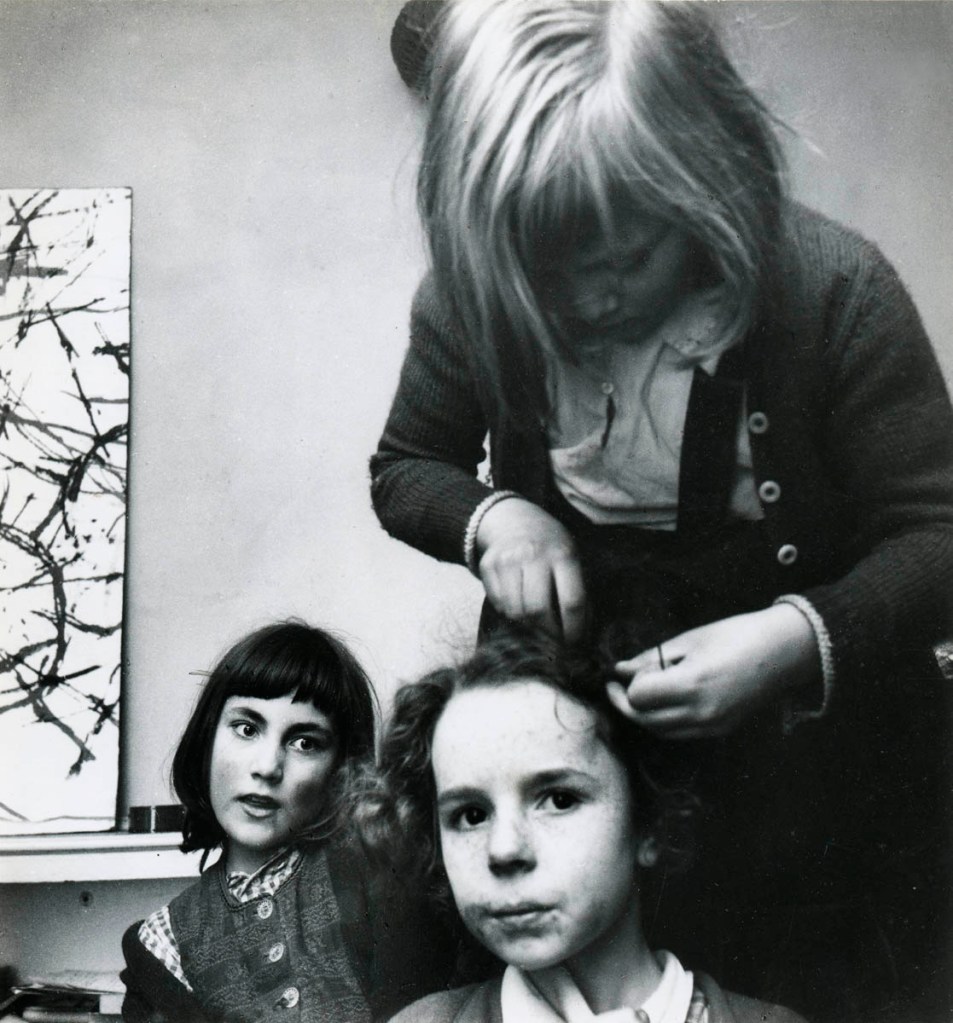 Roger Mayne (British, 1929-2014) 'Three children at Nigel Henderson's: Drusilla (Jo) and Justin Henderson, with a friend, Bethnal Green' 1953