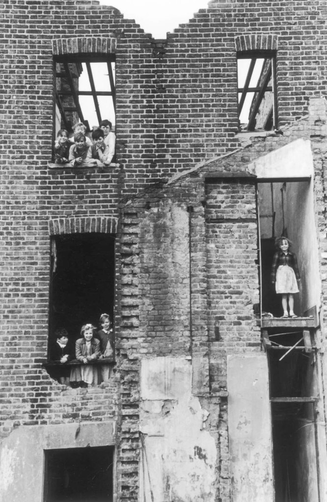 Roger Mayne (British, 1929-2014) 'Children in a Bombed Building, Bermondsey, London' 1954