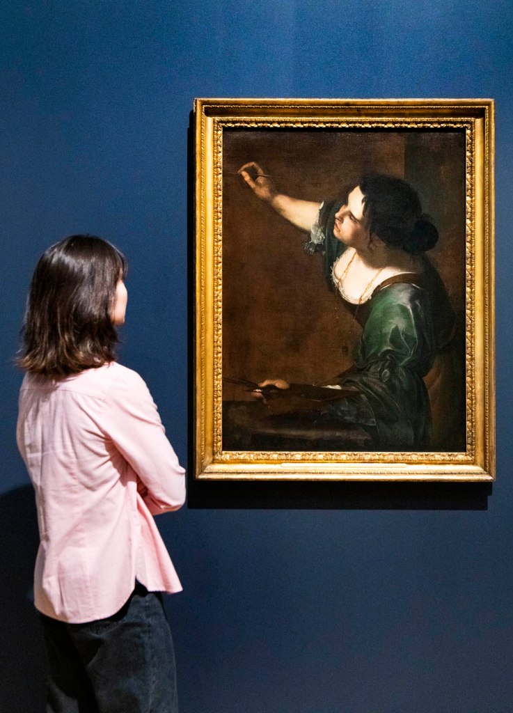 Installation view of the exhibition 'Now You See Us Women Artists in Britain 1520-1920' at Tate Britain showing Artemisia Gentileschi's 'Self-Portrait as the Allegory of Painting (La Pittura)' c. 1638-1639