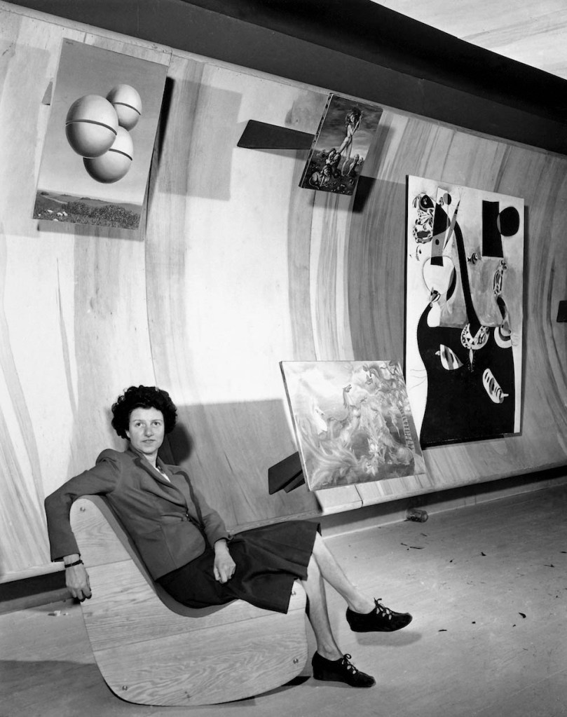 Berenice Abbott (American, 1898-1991) [attributed to] 'Peggy Guggenheim poses at her Art of This Century Gallery in New York, October 22, 1942'