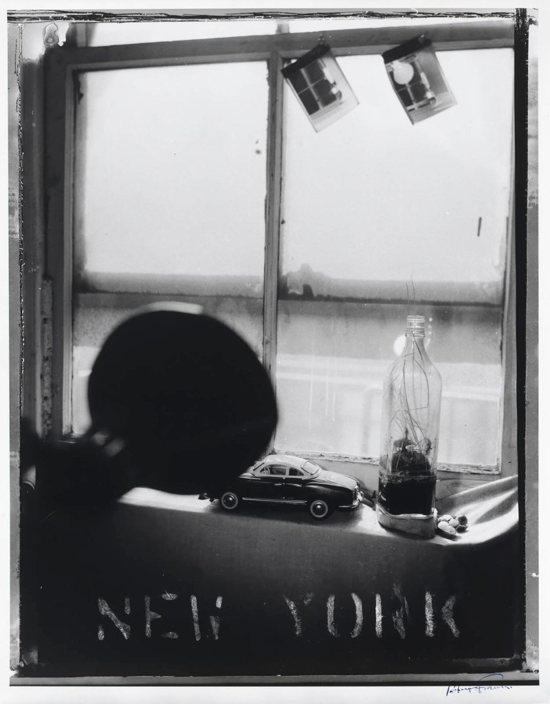 Robert Frank (Swiss-American, 1924-2019) 'Pablo's Bottle at Bleecker Street, New York City' 1973