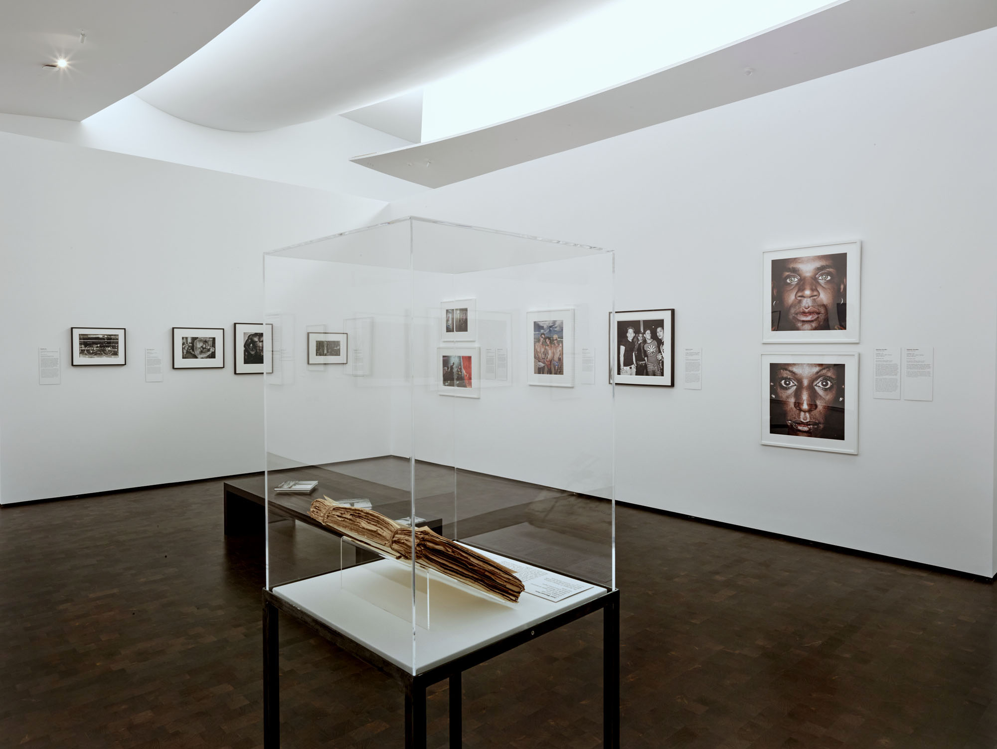Installation view of the exhibition 'Navigating the Waves: Contemporary Cuban Photography' at the Museum of Fine Arts, Houston showing at right top, Alejandro González's 'Untitled' 2008 from the series 'Conducta impropia'; and at second right, Alejandro González's '2:57 am, 24 de dic de 2005, Vedado, La Habana, Cuba' 2005 from the series 'AM-PM' Installation view of the exhibition 'Navigating the Waves: Contemporary Cuban Photography' at the Museum of Fine Arts, Houston showing at right top, Alejandro González's 'Untitled' 2008 from the series 'Conducta impropia'; and at second right, Alejandro González's '2:57 am, 24 de dic de 2005, Vedado, La Habana, Cuba' 2005 from the series 'AM-PM'