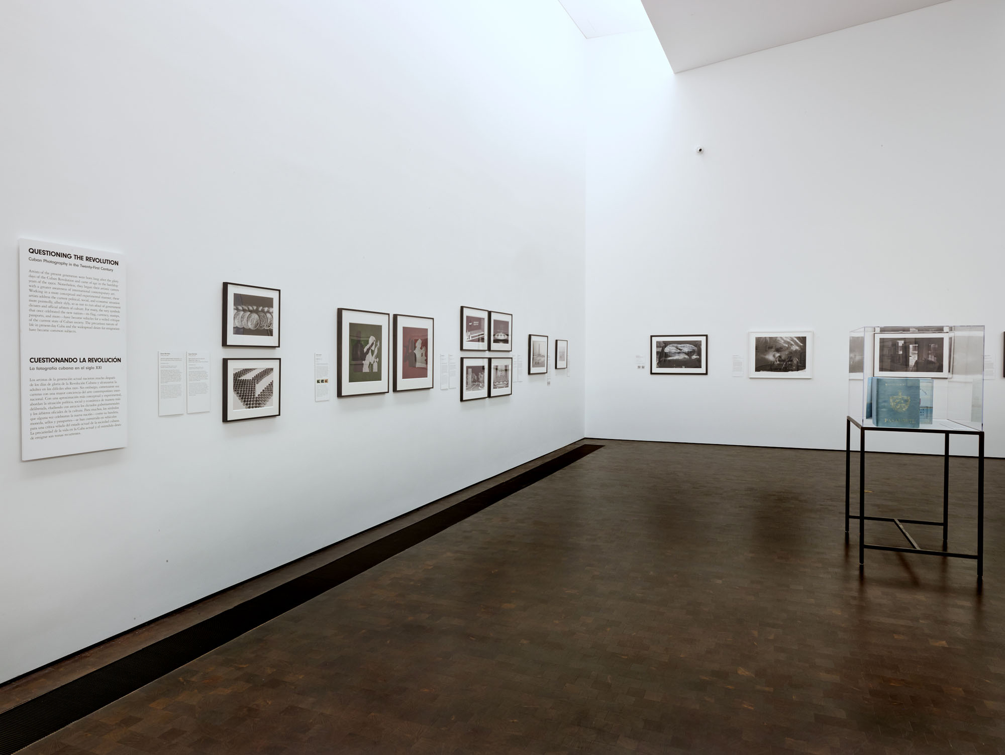 Installation view of the exhibition ‘Navigating the Waves: Contemporary Cuban Photography’ at the Museum of Fine Arts, Houston showing at left the wall text from the section "Questioning the Revolution: Cuban Photography in the Twentieth-First Century" Installation view of the exhibition ‘Navigating the Waves: Contemporary Cuban Photography’ at the Museum of Fine Arts, Houston showing at left the wall text from the section "Questioning the Revolution: Cuban Photography in the Twentieth-First Century"