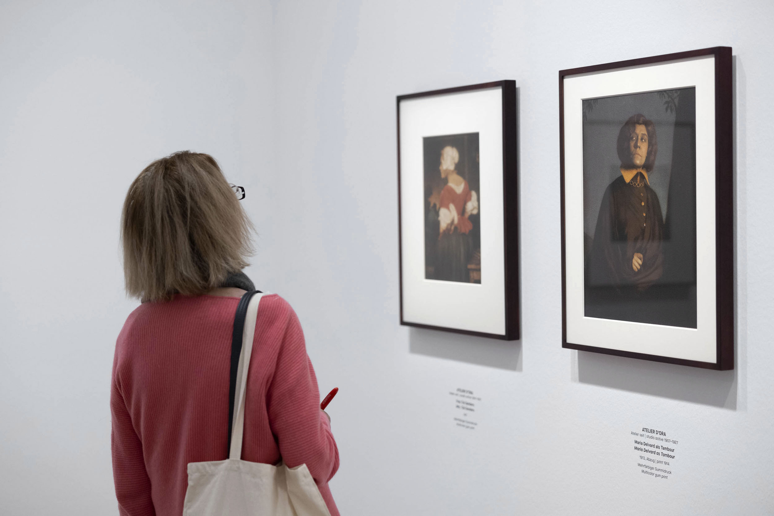 Installation view of the exhibition 'True Colors: Color in Photography from 1849 to 1955' at Albertina Modern, Vienna showing two photographs by Atelier D'Ora with at right, 'Maria Delvard as Tambour' 1913 Installation view of the exhibition 'True Colors: Color in Photography from 1849 to 1955' at Albertina Modern, Vienna showing two photographs by Atelier D'Ora with at right, 'Maria Delvard as Tambour' 1913