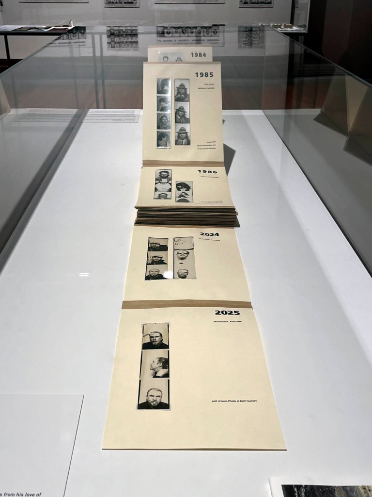 Installation view of Mark S. Holsworth's 'Photo Booth - readymade in 3 minutes' (1984 - continuing) from the exhibition 'Auto-Photo: A Life in Portraits' at RMIT Gallery, Melbourne, June - August, 2025