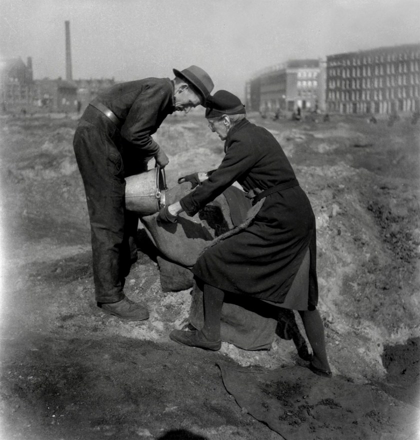 Emmy Andriesse (Dutch, 1914-1953) 'A man and a woman find some coal remains at the Weesperpoort station in Amsterdam' Spring 1945