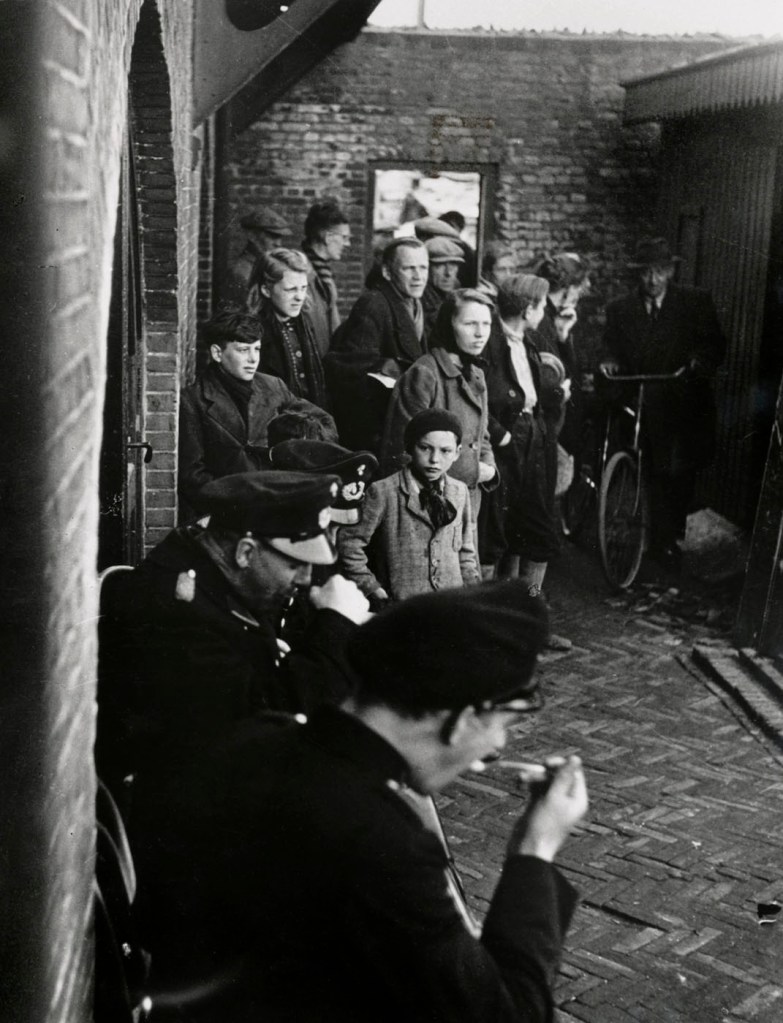 Krijn Taconis (Dutch, 1918-1979) 'Police officers guarding food supplies in the Amsterdam harbour to prevent looting will receive an extra meal' Nd