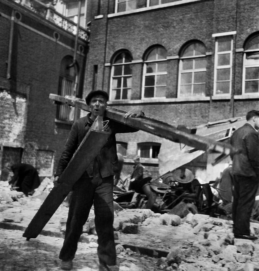 Cas Oorthuys (Dutch, 1908-1975) 'A man collects materials from a demolished building, Zwanenburgstraat' 1944 from the exhibition 'The Underground Camera' at Foam, Amsterdam, May - Sept, 2025