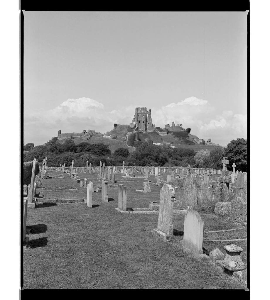 Marcus Bunyan (Australian, b. 1958)
'Corfe Castle and graveyard, Dorset' 1994