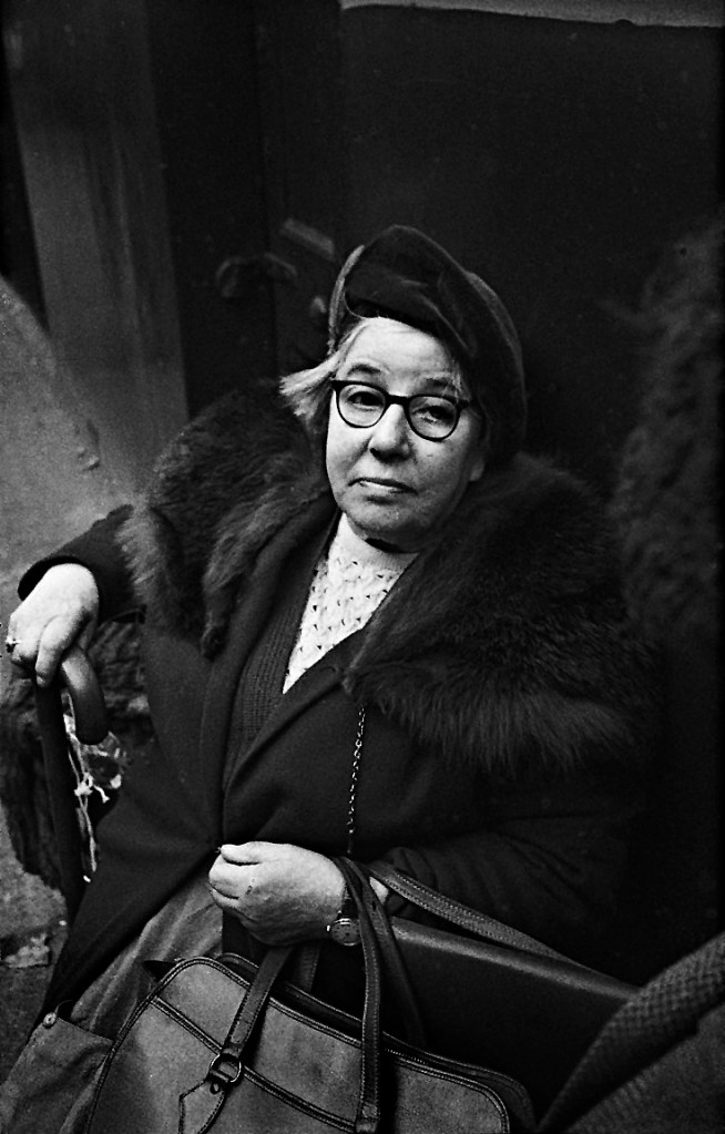 Ron McCormick (English, b. 1947) 'Lady in Sunday best Brick Lane market' 1970 Ron McCormick (English, b. 1947) 'Lady in Sunday best Brick Lane market' 1970