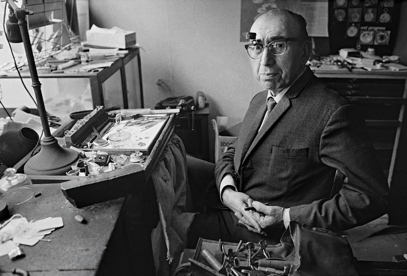 Ron McCormick (English, b. 1947) 'Watch repairer, Black Lion Yard, Whitechapel' 1973 from the exhibition 'A World Apart: Photographing change in London's East End 1970-76' at Four Corners, Oct - Dec, 2025 Ron McCormick (English, b. 1947) 'Watch repairer, Black Lion Yard, Whitechapel' 1973 from the exhibition 'A World Apart: Photographing change in London's East End 1970-76' at Four Corners, Oct - Dec, 2025