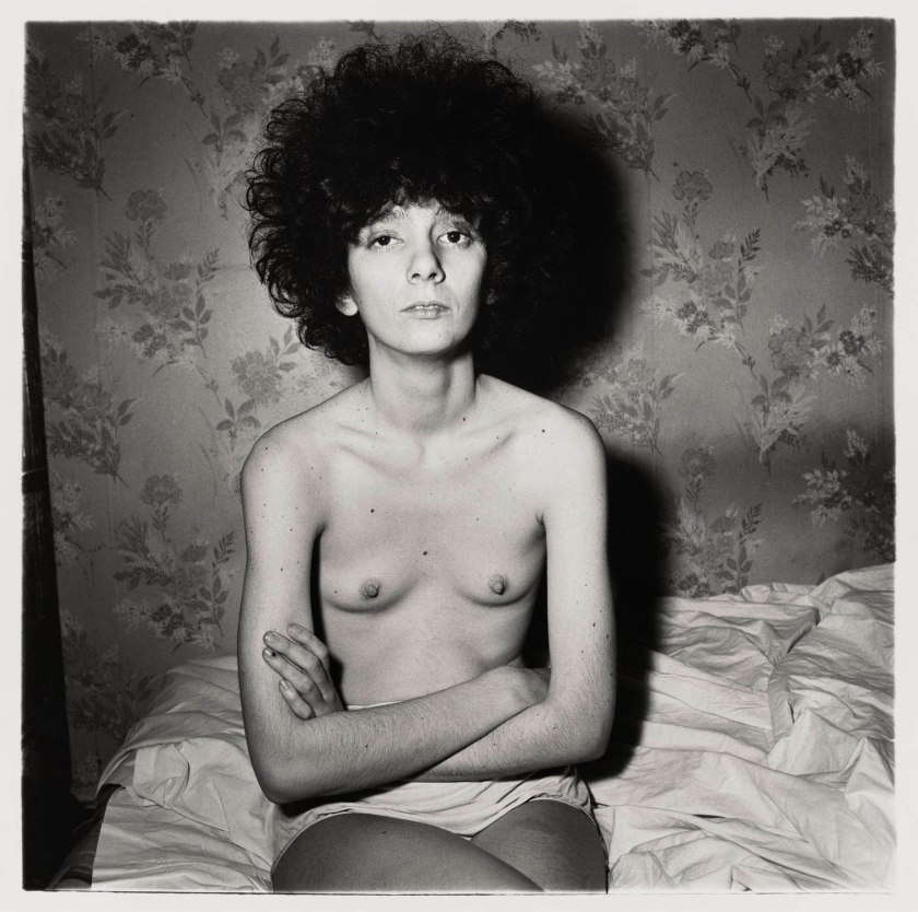 Diane Arbus (American, 1923-1971) 'Girl sitting on her bed with her shirt off, N.Y.C., 1968' 1968