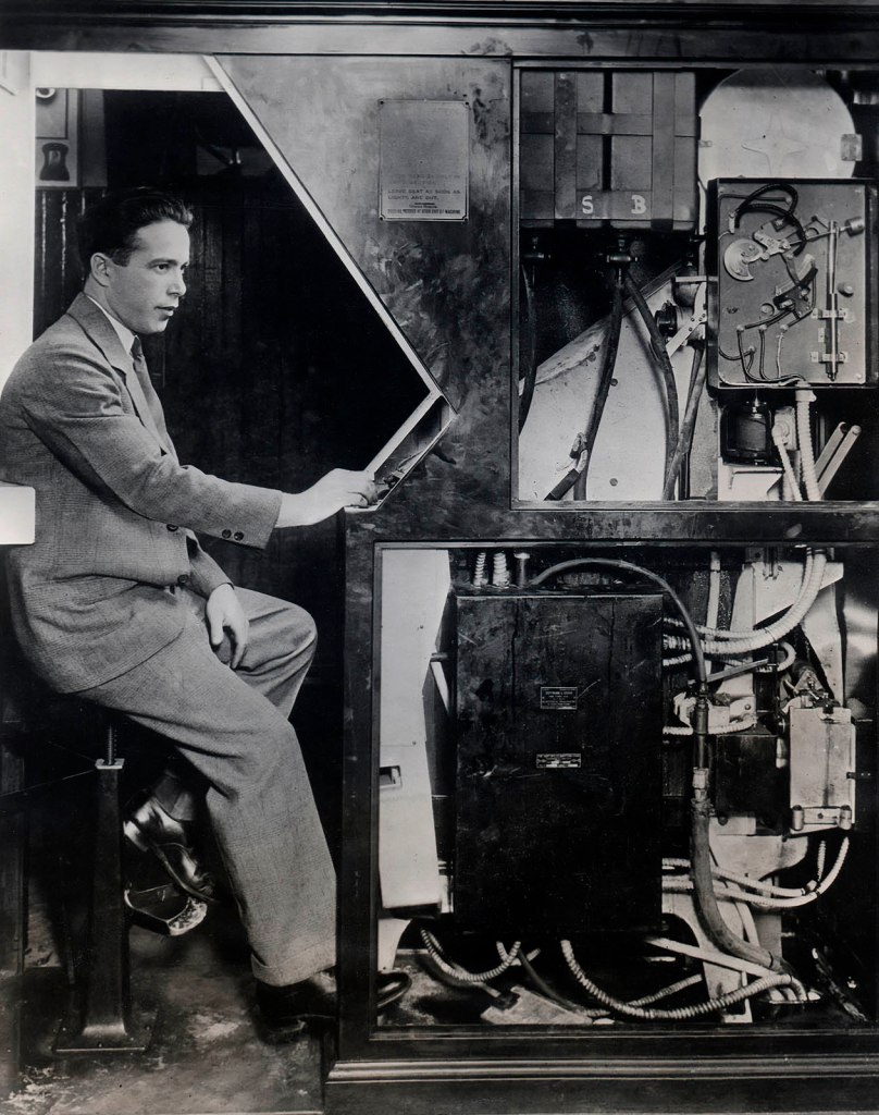 Anonymous photographer. 'Portrait of Anatol Josepho in his Photomaton' United States of America, 1927 from the exhibition 'Strike a Pose! 100 Years of the Photobooth' at The Photographers' Gallery, London, October 2025 - February 2026