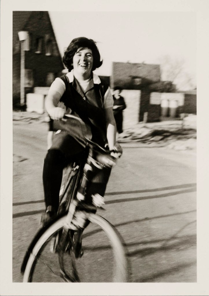 Unknown photographer (Colleague of Asimina Paradissa with her camera) 'Asimina Paradissa on the Bike' Wilhelmshaven, 1966/1967