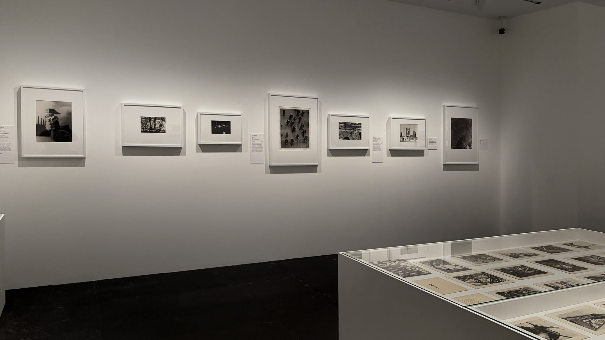 Installation view of the exhibition 'Women Photographers 1900-1975: A Legacy of Light' at NGV International, Melbourne, November 2025 - May 2026 showing at left, Laure Albin Guillot (French, 1879-1962) 'Hammer in bloom' 1940s New acquisition; at second left, Germaine Krull 'The Eiffel Tower' (c. 1928); at third left, Germaine Krull 'At the Galeries Lafayette' c. 1930 New acquisition; at centre, Bea Maddock 'Square' (1972); at third right, Ilse Bing 'Champs de Mars' (1931, printed 1994) New acquisition; at second right, Heather George 'The last wall of Melbourne's Old Eastern Markets comes down for the Southern Cross' (c. 1966, printed 1978); and at right, Olive Cotton 'Radio telescope, Parkes' (1964) Installation view of the exhibition 'Women Photographers 1900-1975: A Legacy of Light' at NGV International, Melbourne, November 2025 - May 2026 showing at left, Laure Albin Guillot (French, 1879-1962) 'Hammer in bloom' 1940s New acquisition; at second left, Germaine Krull 'The Eiffel Tower' (c. 1928); at third left, Germaine Krull 'At the Galeries Lafayette' c. 1930 New acquisition; at centre, Bea Maddock 'Square' (1972); at third right, Ilse Bing 'Champs de Mars' (1931, printed 1994) New acquisition; at second right, Heather George 'The last wall of Melbourne's Old Eastern Markets comes down for the Southern Cross' (c. 1966, printed 1978); and at right, Olive Cotton 'Radio telescope, Parkes' (1964)