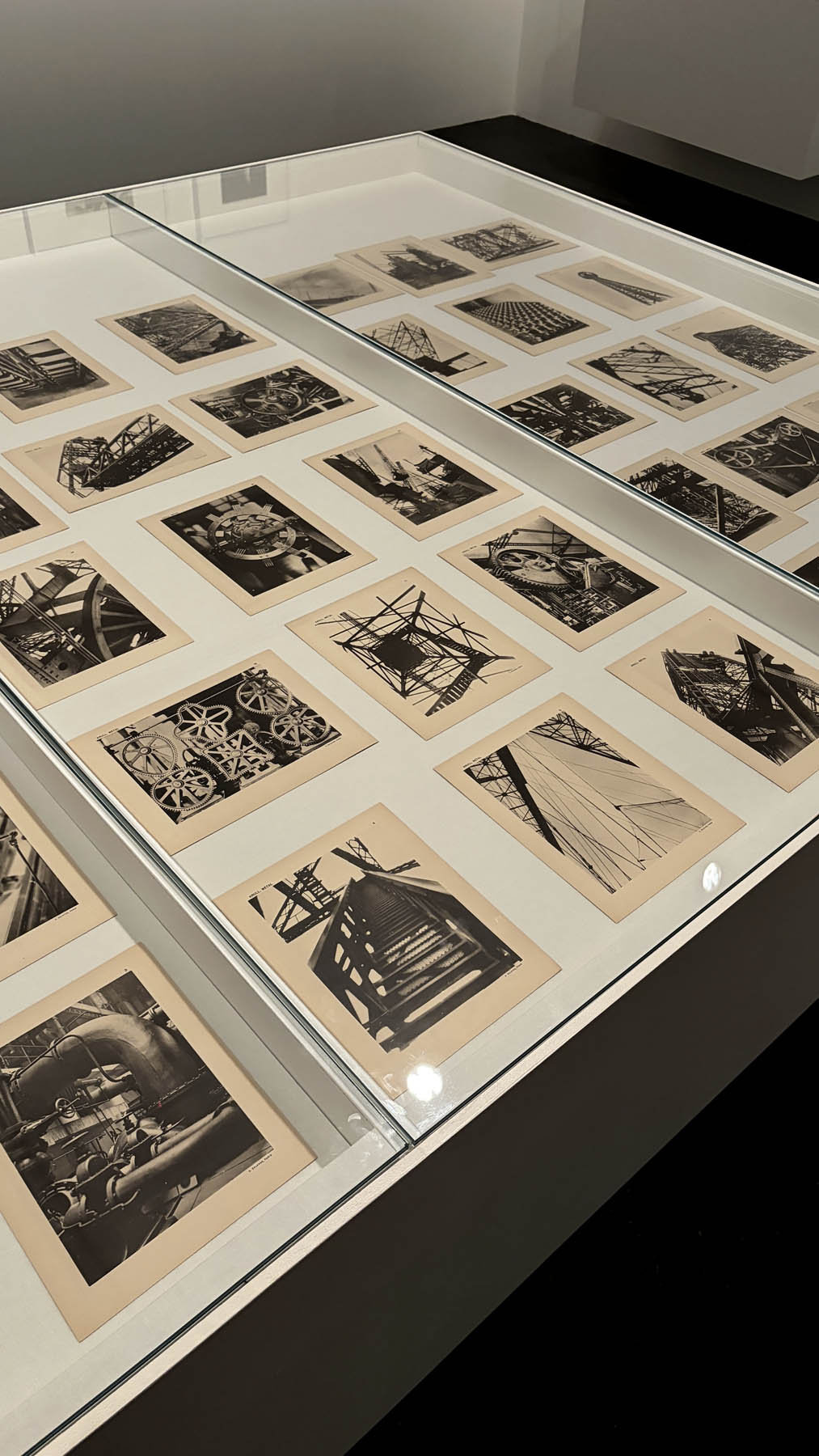 Installation view of the exhibition 'Women Photographers 1900-1975: A Legacy of Light' at NGV International, Melbourne, November 2025 - May 2026 showing in the foreground, Germaine Krull's portfolio 'Métal' 1928 Installation view of the exhibition 'Women Photographers 1900-1975: A Legacy of Light' at NGV International, Melbourne, November 2025 - May 2026 showing in the foreground, Germaine Krull's portfolio 'Métal' 1928