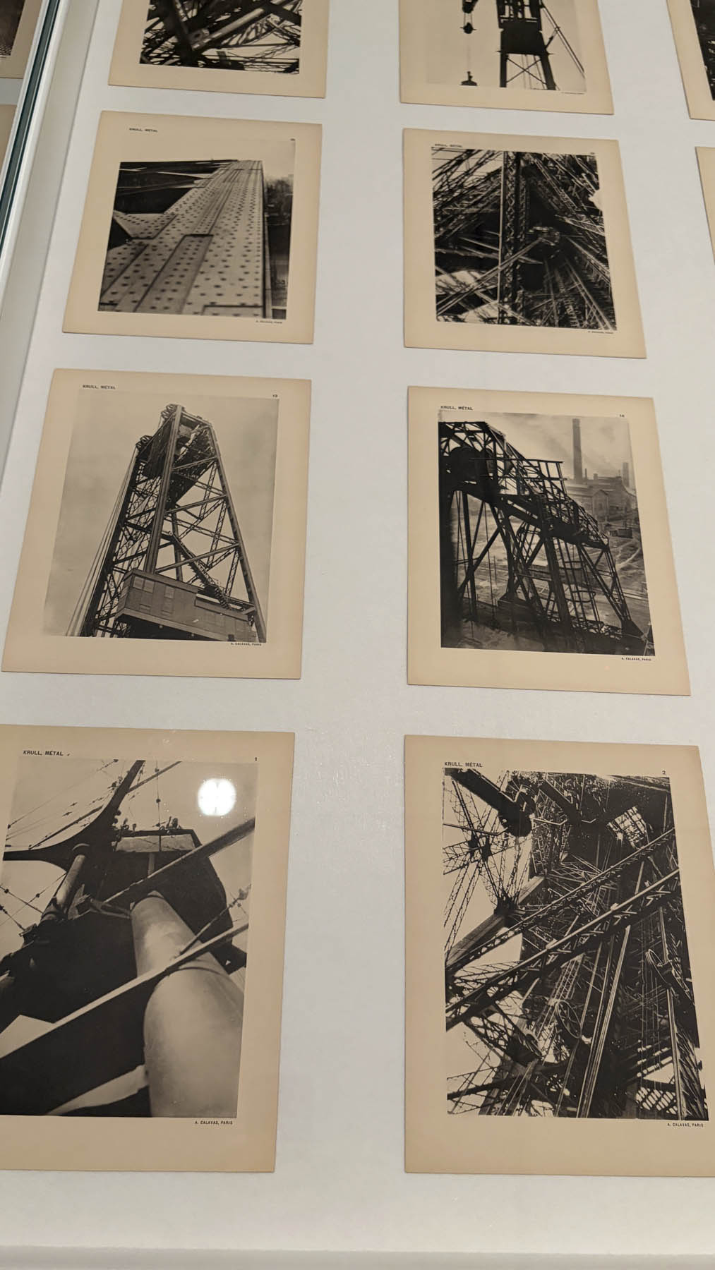 Installation view of the exhibition 'Women Photographers 1900-1975: A Legacy of Light' at NGV International, Melbourne, November 2025 - May 2026 showing in the foreground, Germaine Krull's portfolio 'Métal' 1928 Installation view of the exhibition 'Women Photographers 1900-1975: A Legacy of Light' at NGV International, Melbourne, November 2025 - May 2026 showing in the foreground, Germaine Krull's portfolio 'Métal' 1928