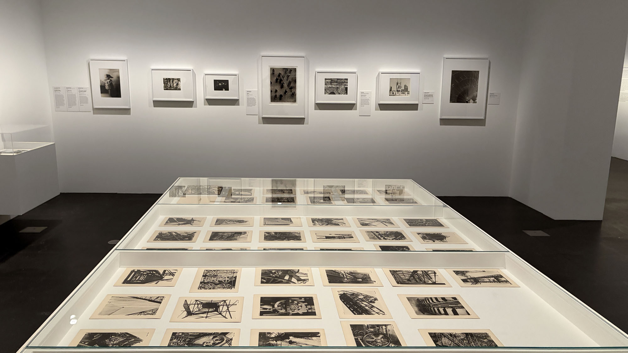 Installation view of the exhibition 'Women Photographers 1900-1975: A Legacy of Light' at NGV International, Melbourne, November 2025 - May 2026 showing in the foreground, Germaine Krull's portfolio 'Métal' 1928 Installation view of the exhibition 'Women Photographers 1900-1975: A Legacy of Light' at NGV International, Melbourne, November 2025 - May 2026 showing in the foreground, Germaine Krull's portfolio 'Métal' 1928