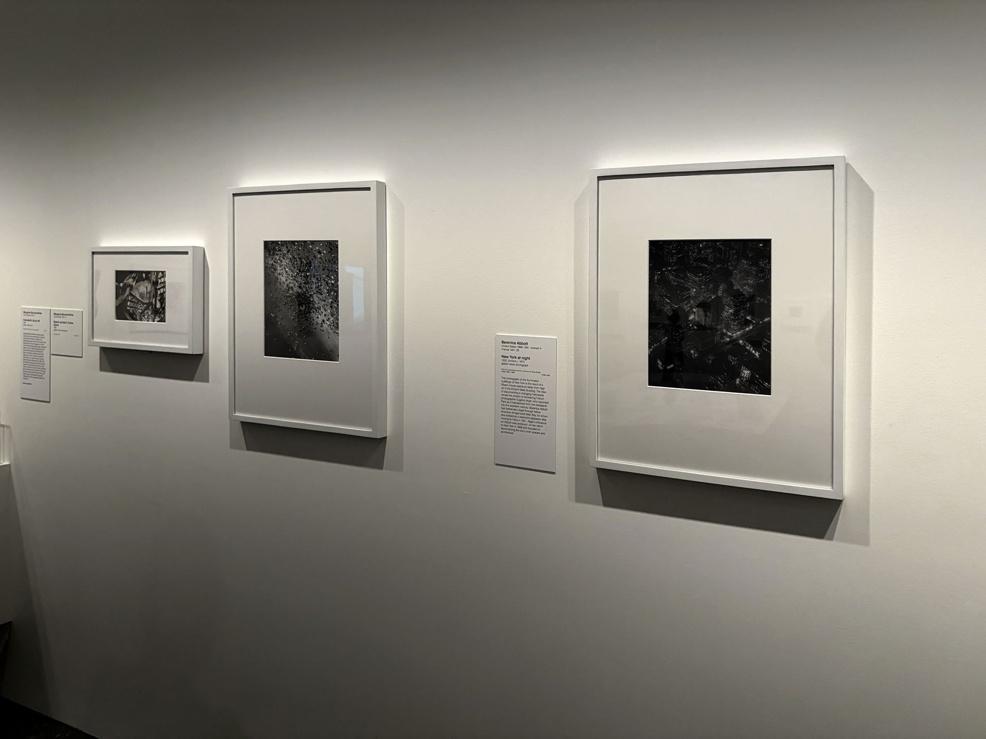 Installation view of the exhibition 'Women Photographers 1900-1975: A Legacy of Light' at NGV International, Melbourne, November 2025 - May 2026 showing at left, Margaret Bourke-White 'Campbell's Soup No. 6' (1935); Margaret Bourke-White 'Beach accident, Coney Island' (1952); and at right, Berenice Abbott 'New York at night' (1932 printed c. 1975) Installation view of the exhibition 'Women Photographers 1900-1975: A Legacy of Light' at NGV International, Melbourne, November 2025 - May 2026 showing at left, Margaret Bourke-White 'Campbell's Soup No. 6' (1935); Margaret Bourke-White 'Beach accident, Coney Island' (1952); and at right, Berenice Abbott 'New York at night' (1932 printed c. 1975)