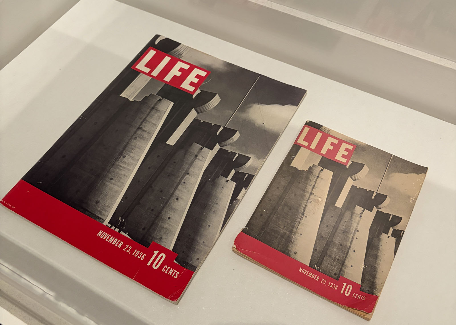 Margaret Bourke-White (American, 1904-1971) 'Fort Peck Dam, Montana' Front cover, 'Life' magazine, first issue, November 1936 (left); Margaret Bourke-White (American, 1904-1971) 'Fort Peck Dam, Montana' Front cover, 'Life' magazine, first issue, November 1936, 'Salesman's edition' (second left) Margaret Bourke-White (American, 1904-1971) 'Fort Peck Dam, Montana' Front cover, 'Life' magazine, first issue, November 1936 (left); Margaret Bourke-White (American, 1904-1971) 'Fort Peck Dam, Montana' Front cover, 'Life' magazine, first issue, November 1936, 'Salesman's edition' (second left)