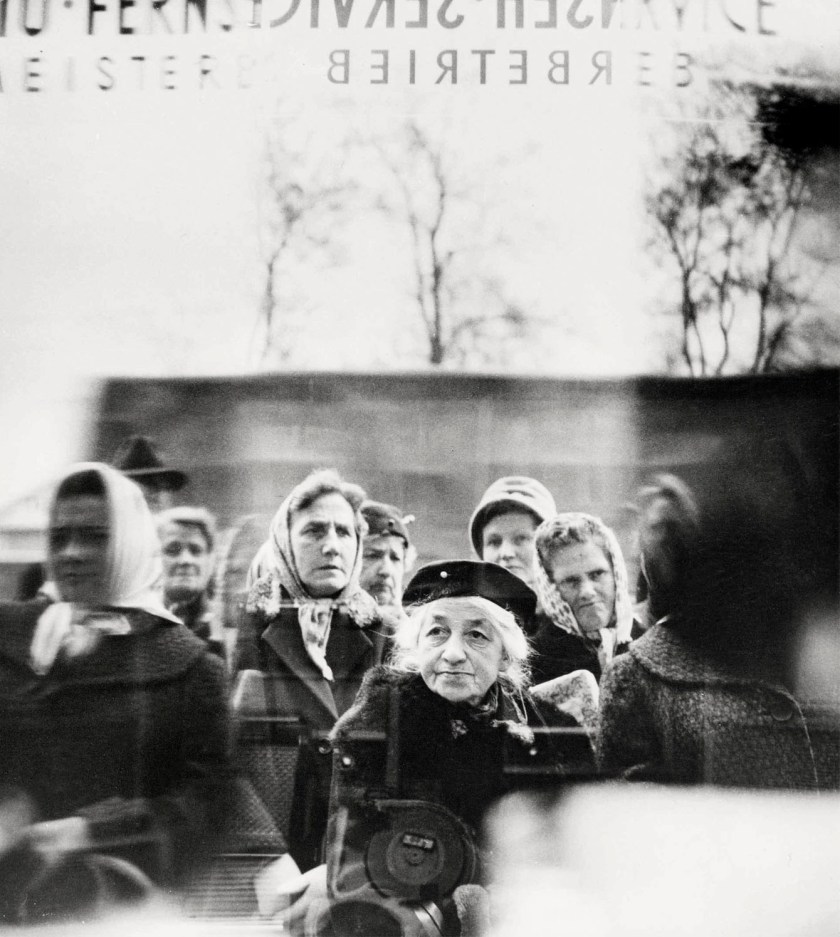 Barbara Pflaum (Austrian, 1912-2002) 'Passers-by standing in front of the shop window of an electrical goods store displaying a television, Vienna' c. 1960