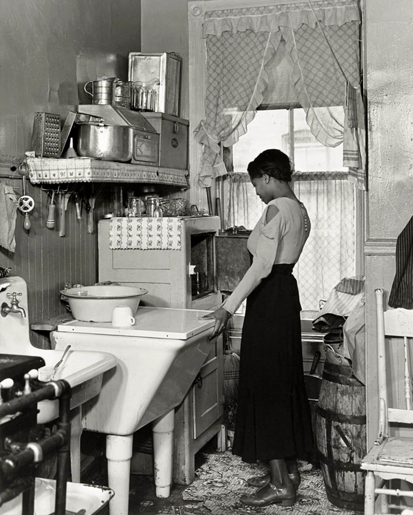 Aaron Siskind (American, 1902-1991) 'Lady In Kitchen' 1937