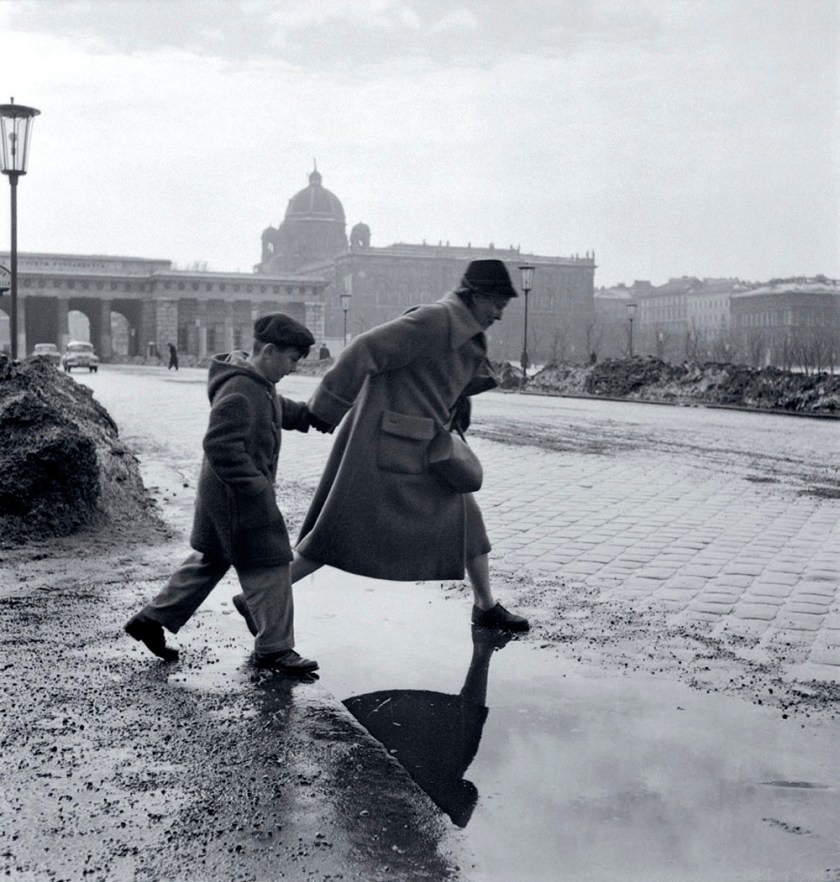 Barbara Pflaum (Austrian, 1912-2002) 'Jumping over a puddle on Heldenplatz, Vienna, Austria' 1960