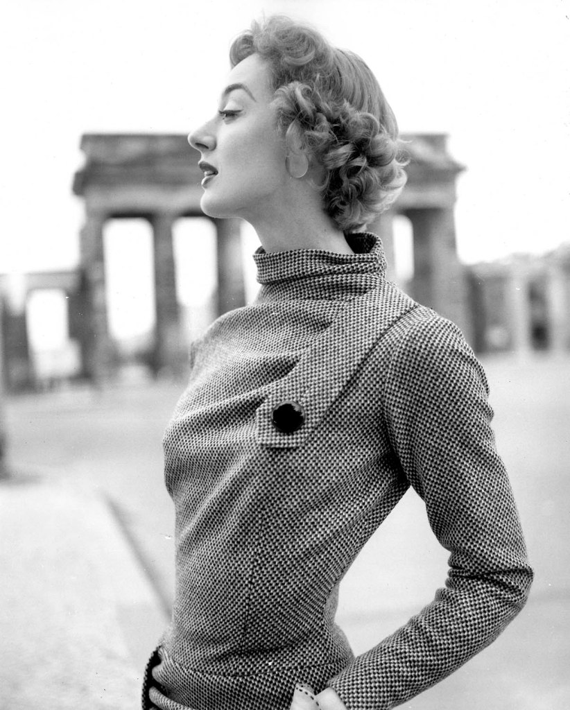 F.C. Gundlach (German, 1926-2021) ''Costumes of the Season', Eleanor in front of the Brandenburg Gate', Berlin (West), 1955