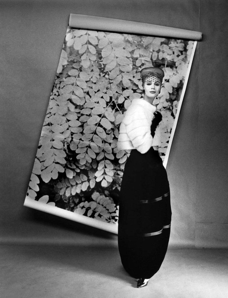 F.C. Gundlach (German, 1926-2021) 'Uli Richter, Directoire-style evening gown in front of backdrop', Berlin (West), 1958