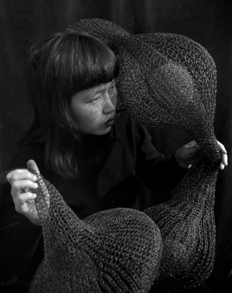 Imogen Cunningham (American, 1883-1976) 'Holding a form-within-a-form sculpture' 1951 Imogen Cunningham (American, 1883-1976) 'Holding a form-within-a-form sculpture' 1951