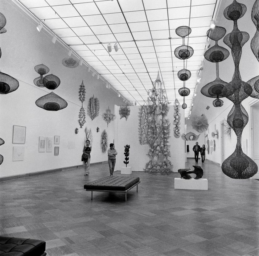 Laurence Cuneo (American) 'Ruth Asawa (second from left) with visitors to her exhibition Ruth Asawa: A Retrospective View, San Francisco Museum of Art (now SFMOMA)' 1973 Laurence Cuneo (American) 'Ruth Asawa (second from left) with visitors to her exhibition Ruth Asawa: A Retrospective View, San Francisco Museum of Art (now SFMOMA)' 1973