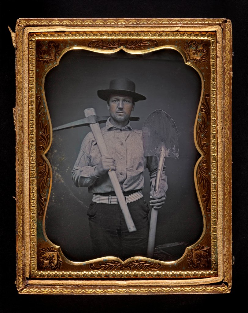 Unknown photographer (American) 'Portrait of a California gold miner with pick and shovel' c. 1855