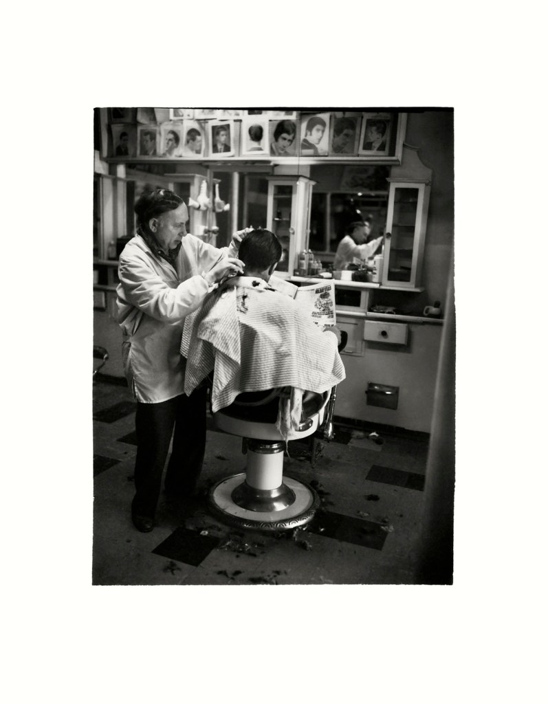 Viva Gibb (Australian, 1945-2017) 'Jack Rozen at his barber shop, 9 Errol Street, North Melbourne' 1983