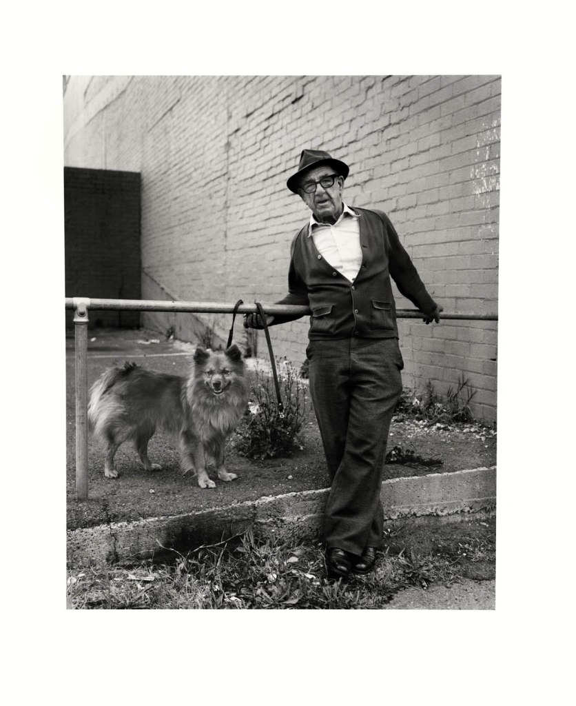 Viva Gibb (Australian, 1945-2017) 'Man and his dog outside Radio Parts, corner of Spencer and Hawke Street, West Melbourne' c. 1980