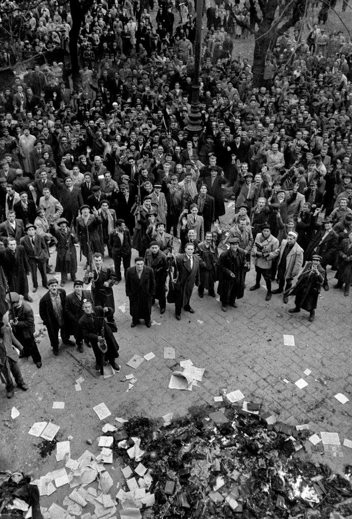 John Sadovy (English born Czech, 1925-2010) 'The crowd in front of the party headquarters in Köztársaság Square' Hungary October 1956